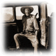 Old man in antique car